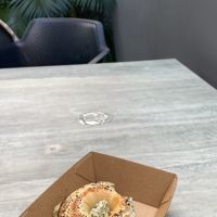 Half eaten “salmon” bagel because I couldn’t wait to eat it before I took a photo. SO GOOD   at Little No Bones in Byron Bay