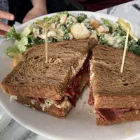 Vegan rueben sandwich with Caesar salad  at Evviva - Yonge St in Toronto