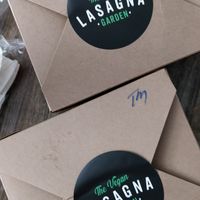 Take out boxes (pop out the corners to make it lay flat like a plate) at The Vegan Lasagna Garden - Cloud Kitchen in Milpitas