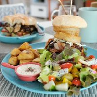 Power burger with salad and fries at Beyond The Root in Khao Lak