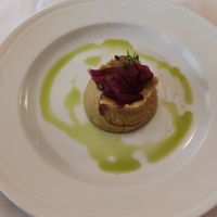 Tortino di ceci con cipolle caramellate e olio al basilico 🌿 at Sapori di Casa in Aosta