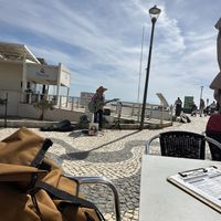 Terrace is right near the beach   at Bar Habana in Praia Da Luz