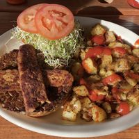 OLD TOWN MUSHROOM-SUNFLOWER BURGER w/ home fries  *added daily special, tempeh bacon*   at Old Town Cafe in Bellingham