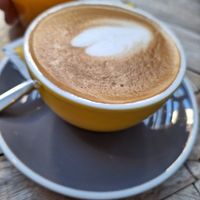 Flat white with almond milk at Amélia Lisboa in Lisbon