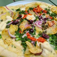 Pizza with olives & peppers at Planta in Bethesda