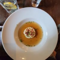 Cheesy dumpling soup at Tisch in Vienna