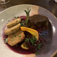 Roasted goose with dumpling slices, gravy and red cabbage - perfect!  at Tisch in Vienna