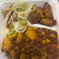 Vegan beefless steak entree with beans, rice, & plantains  at Earthy Picks in Orlando