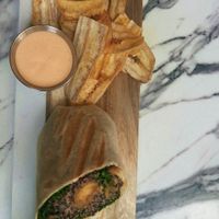 Burrito with quinoa, plantains, kale  at Earthy Picks in Orlando
