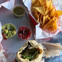 Burrito menu with salsa and guacamole   at Arriba! Taqueria in Budapest