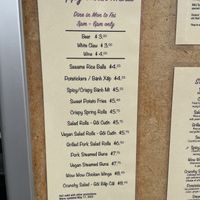 Happy hour menu with vegan options listed  at XinhXinh Bistro in Portland