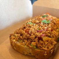 Avocado toast on multigrain bread, topped with crispy shallots  at Love Life Cafe in Laurel