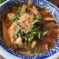 Tom Yum with sheet glass noodles  at Anotai in Bangkok