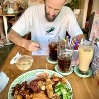 Nasi campur and entertainment 🦖🖍️  at Warung Dua Hati in Canggu