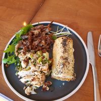 Vegan sausage roll, sesame and soy roasted cauliflower, cabbage and mushrooms, and fennel and pak choi salad at Locavore Grocery & Canteen in Edinburgh