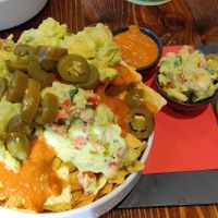 Vegan nachos with jalapenos, salsa and guacamole at The Huggy's Bar - Bruxelles 1 in Brussels