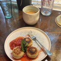 Тофу-сырники с клубничным джемом и капучино  at Coffee Place in Tbilisi