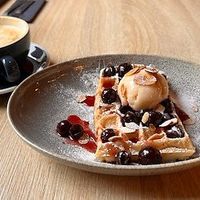 vegan Cherry Bakewell and vanilla latte at Madame Waffle in Lincoln