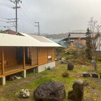 garden and hallway to the private hot spring bath. at Yuzaka - Natural & Sustainable Inn in Kazuno