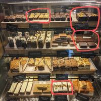 Vegan Cake Options - blackcurrant crumble, chocolate and orange cake, chocolate tiffin, carrot cake at Coffee #1 - Bath City Centre in Bath