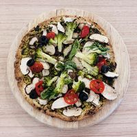 Basil Pizza: Wholewheat thin crust, basil puree, mushroom, cherry tomato, broccoli, olive, and spinach. Ask for the mozzarella to be removed to make it vegan.   at The Leaf 绿叶坊 - Georgetown in Penang