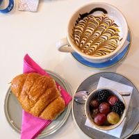 Colazione vegan con macedonia, maxi cappuccino di soia, croissant vuoto at Caffè Letterario in Ravenna