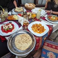pita, roast potatoes and duvec (all vegan) from left to right, my friends had the veggie plate and other vegetarian sides (in the back) at Sadrvan in Mostar