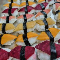 Sushis vegan, made with pickled beets, carrots, daikon ! Very tasty at Totem & Tempo Restaurant Bar Tapas in Lyon