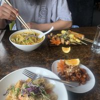 Coconut tempeh closest to me, skewers next to Matt   at My Thai Lounge in Queenstown