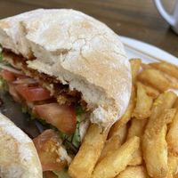 Vegan chicken burger and chips   at Happy Place  in North Ward