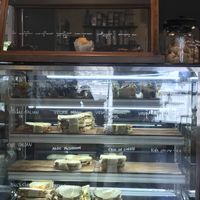 toastie and cake cabinet, vegan options well marked  at Grumbling Goose in Belgrave
