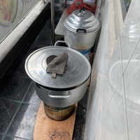 Cooking over charcoal on the balcony   at Chay Saigon Bistro in Ho Chi Minh City