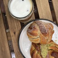 Iced oat latte, cardamom bun and pistachio bun  at Håndbakt in Oslo