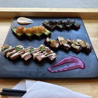 From top to bottom: Red Chard, Mexican, King Oyster Mushroom, and “Tuna.” Sauces are Spicy Mayo and Vivid Beets.  at Cofu in Vancouver