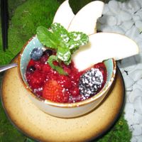Dessert "ERDE AUS FERNOST" on a nicely decorated table at Secret Garden in Munich