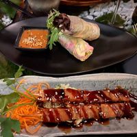 top: Pink Misaki Summer Rolls | bottom: Yakitari soy skewer  at Secret Garden in Munich