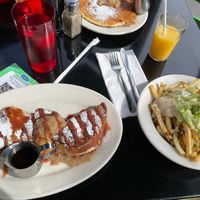 Vegan stuffed French toast, vegan cheesy fries, and vegan pancakes at Veggie Galaxy in Cambridge