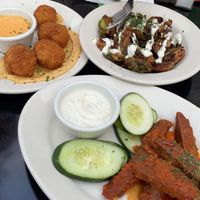 Buffalo wings, mac and cheese bites, crispy brussels sprouts (all appetizers!!)  at Veggie Galaxy in Cambridge