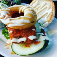 Spicy chikn burger with a nice big onion ring   at Veggie Galaxy in Cambridge
