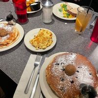 full spread (tofu scramble pictured in middle) and tater tot’s with vegan ranch behind it   at Veggie Galaxy in Cambridge