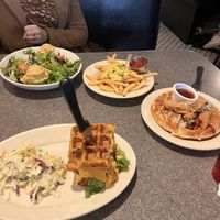 Cheesy fries (best), chicken and waffles, mac n cheese waffle thing with coleslaw  at Veggie Galaxy in Cambridge