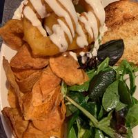 Buffalo Chick’n sandwich topped with onion rings  at Veggie Galaxy in Cambridge