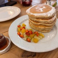 Oat milk pancakes with fruits. It comes in stacks of 3. You have the option of adding 3 more stacks for a few more euros.   at Billy Brunch Sevilla in Sevilla