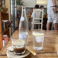 Iced coffee and water with lemon  at Billy Brunch Sevilla in Sevilla