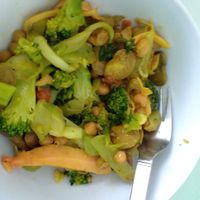 The results of mixing everything together in one container...note also the pickled mango on the right.  So very much flavor in one mystery bowl. at Burmese Bowls in Mae Sai