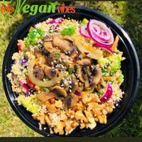 Stir Fry Quinoa Bowl ( Quinoa, sweet peppers, broccoli,purple onions,carrots, Topped with sauted mushrooms and walnuts) at Irie Vegan Vibes in Georgetown