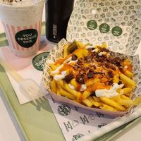 Loaded fries, Oreo shake, sparkling water at Neat Burger - Bishopsgate in London