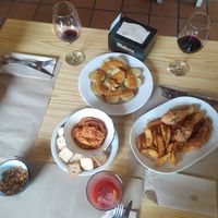 Humus de calabaza, papas con mojo y veganos. Vinos y zumo de tomate. at Hostel La Pedriza in Manzanares El Real