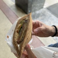 vegan sandwich with hummus, mint, eggplant, bell pepper, tomato, and soy mayo  at TRAME' in Milan