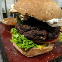 Ready to go quinoa burger  at XMarket & Vegan Food Hall - Uptown in Chicago